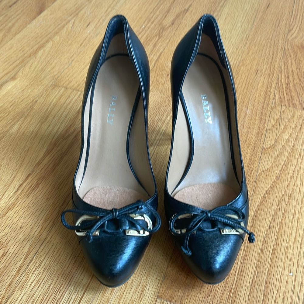 Bally black leather stilettos. Bow and gold buckle detail. 3 3/4” 9.5cm heel.